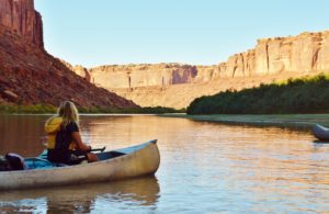 girl in Canoe in calm river