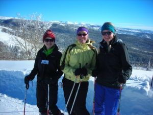Three Girls with Skis